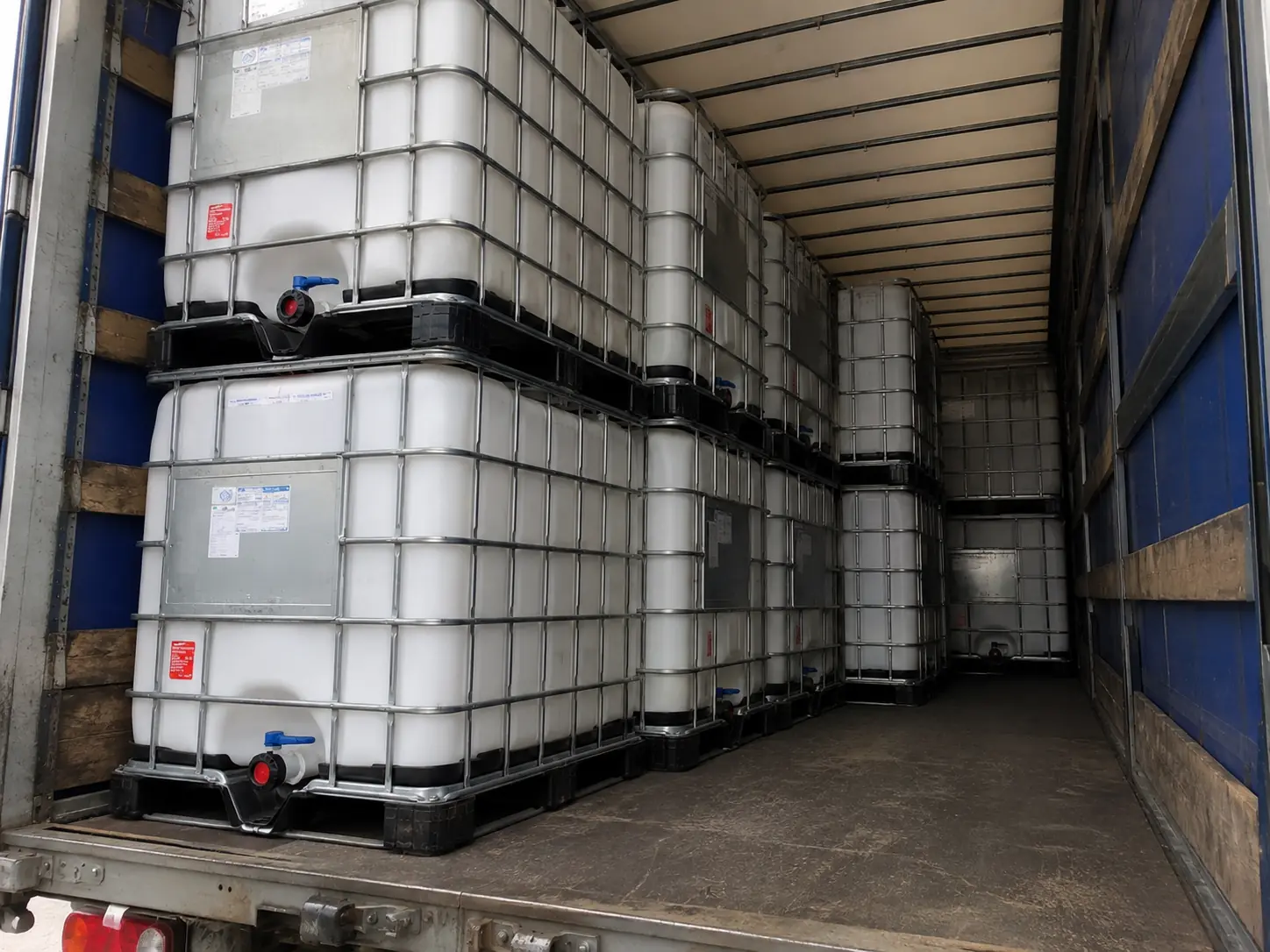 The inside of a 53-foot trailer loaded with IBC totes ready for delivery across the New York metro
